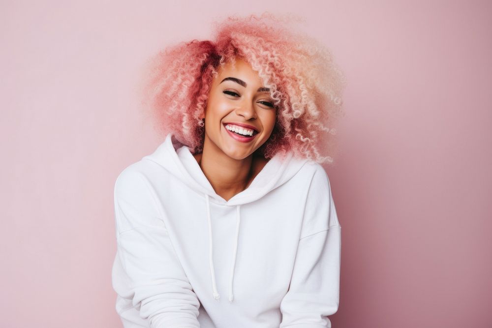 A black woman with white casual home attire mockup and bright hair color smiling laughing person female.