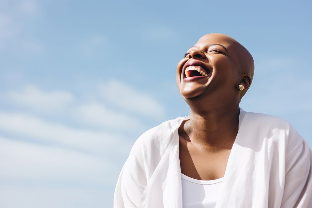 Chubby bald black woman laughing person female happy.