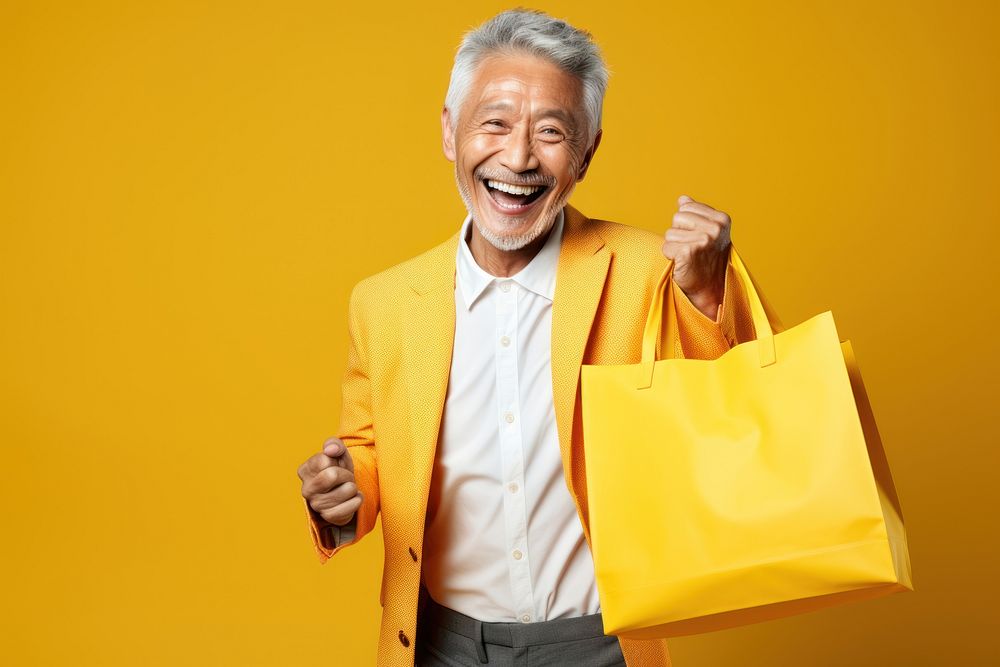 Happy senior Japanese man bag accessories accessory.