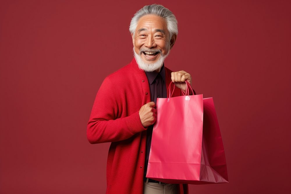 Happy senior Japanese man bag accessories accessory.