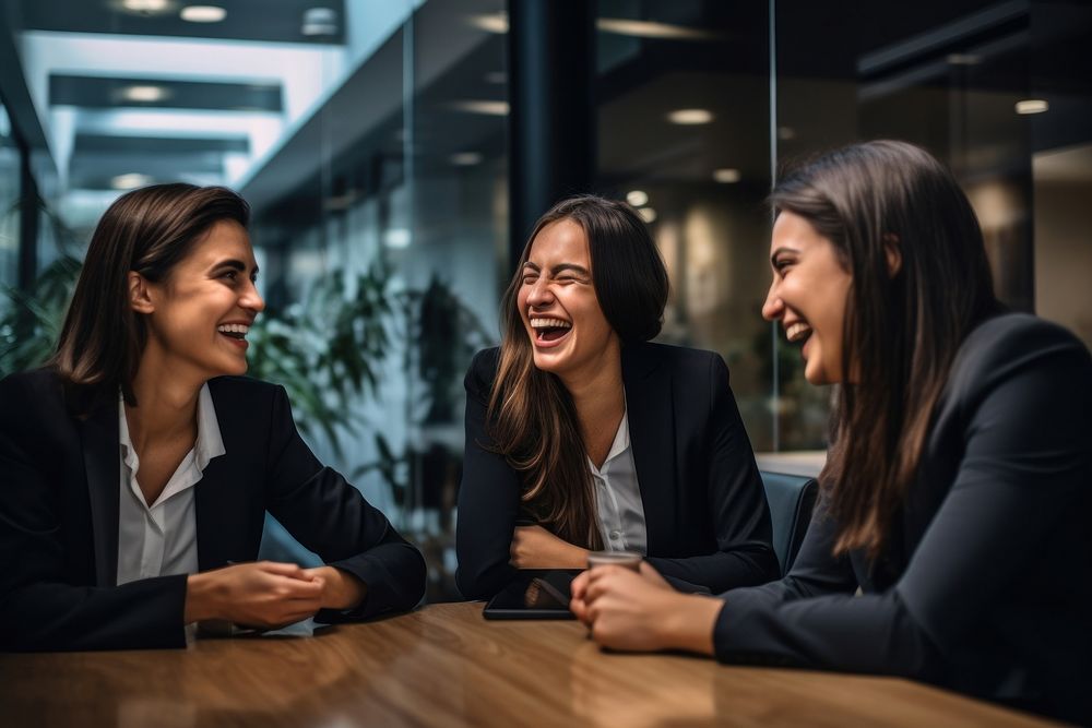 Office workers laughing in the meeting room person female human.