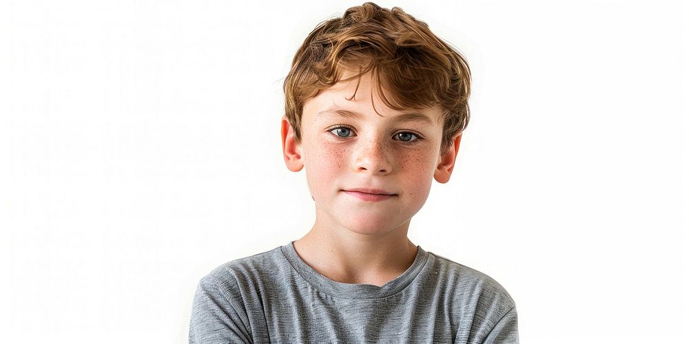 Boy posing confidently portrait photo white background.