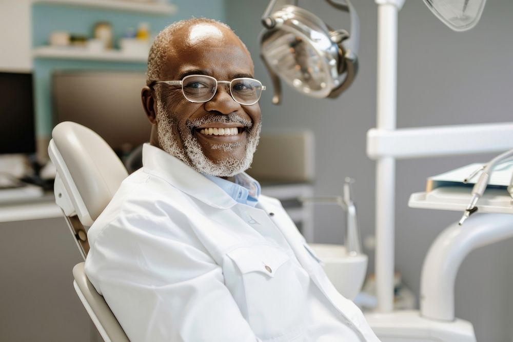 Man smiling with white teeth glasses dentist adult.