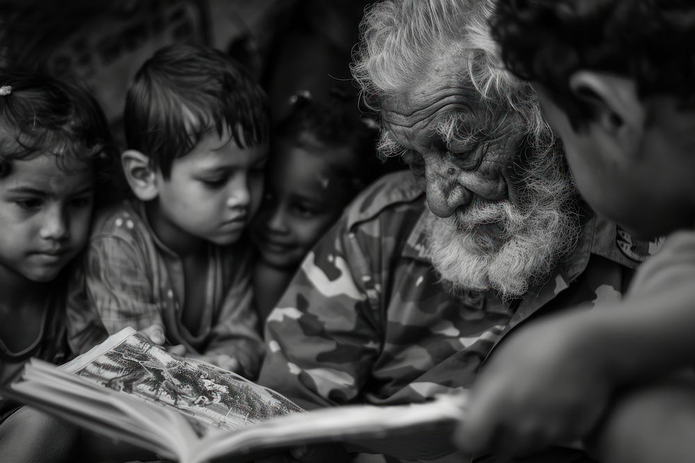 Veteran sharing war stories child publication reading.