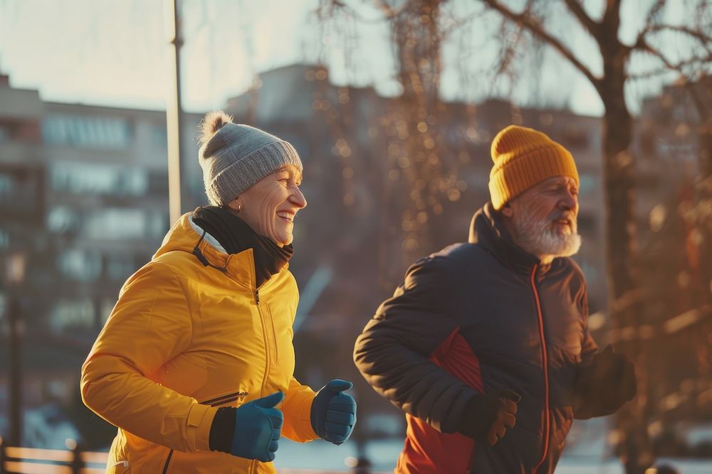 Older man and woman outdoors glove adult.