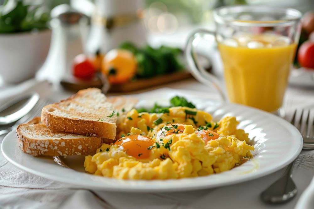 Breakfast with scrambled eggs brunch bread plate.