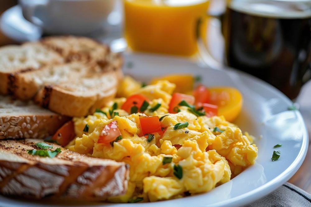 Breakfast with scrambled eggs brunch bread plate.