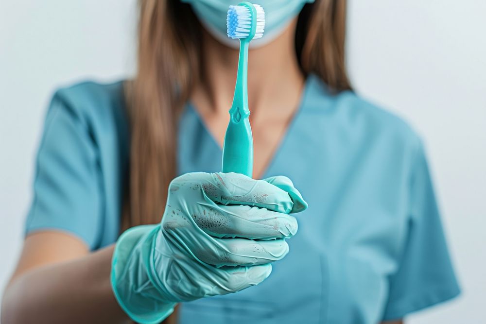 Toothbrush dentist doctor holding cleaning.