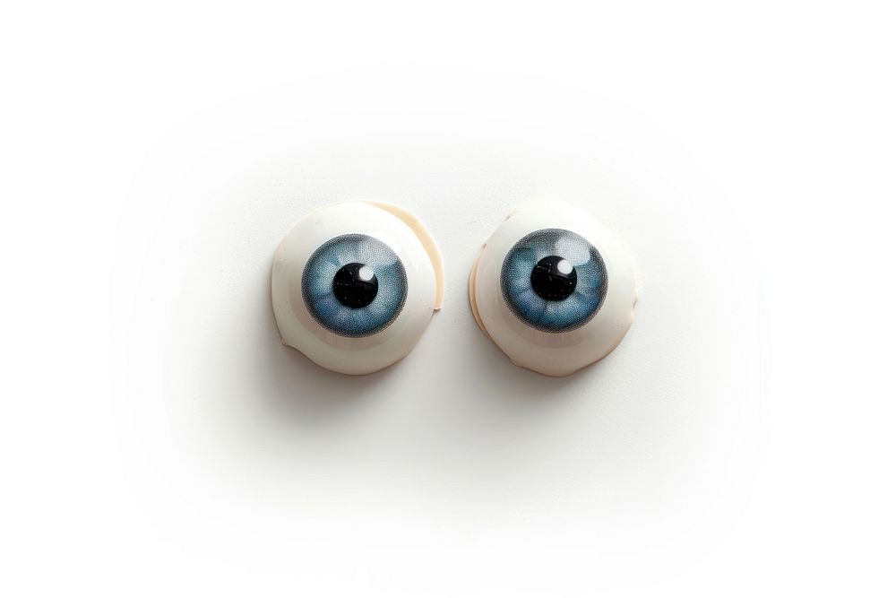 One set of googly eyes jewelry white background accessories.