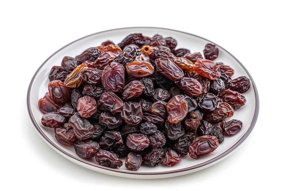 Photo of raisin raisins plate white background.