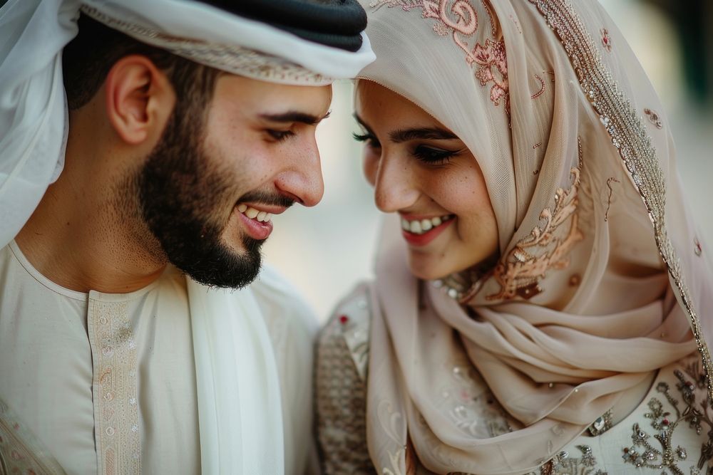 Arabic couple newlywed looking at each other wedding happy bridegroom.