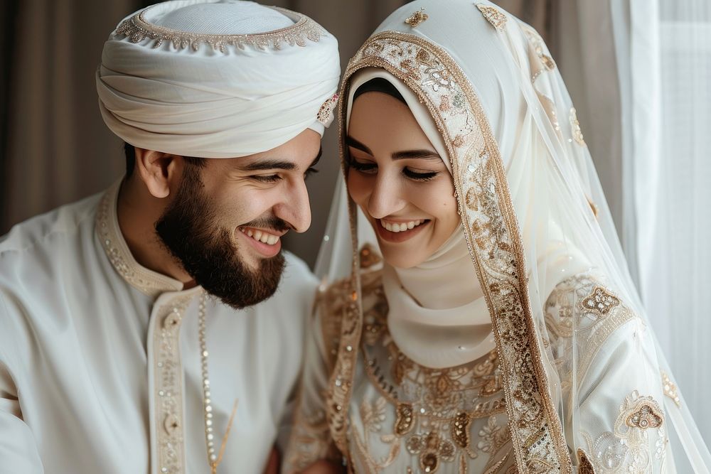 Muslim couple newlywed looking at each other bridegroom clothing wedding.