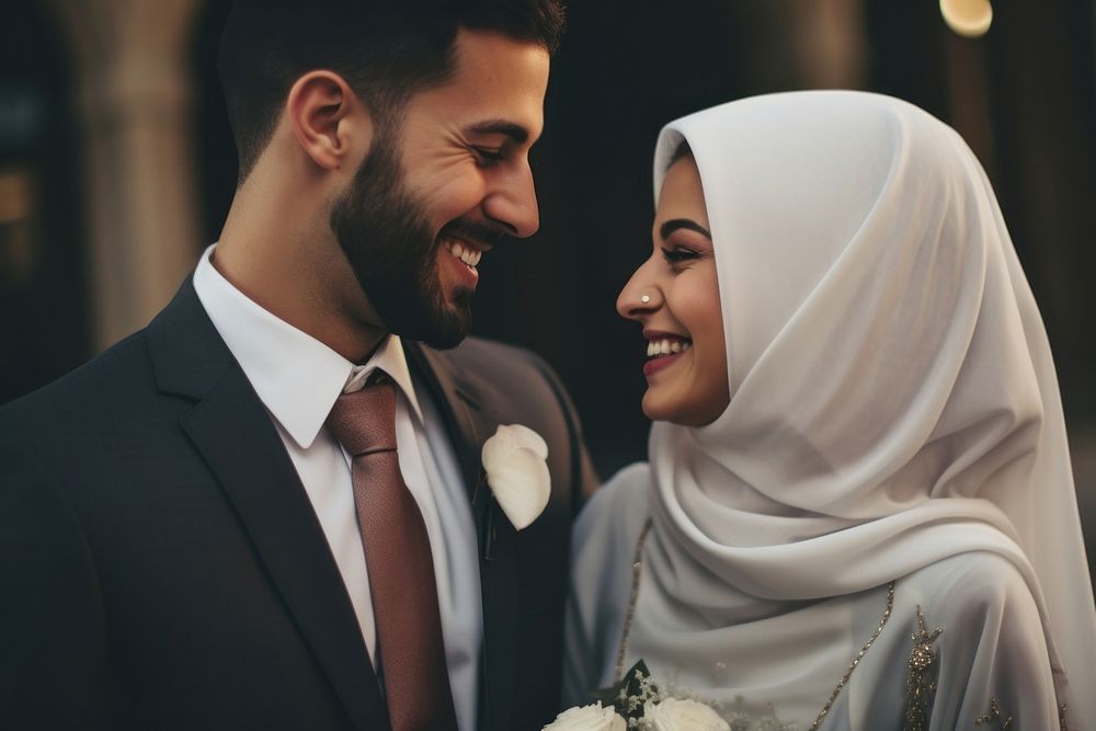 Arabic couple newlywed looking at each other wedding happy accessories.
