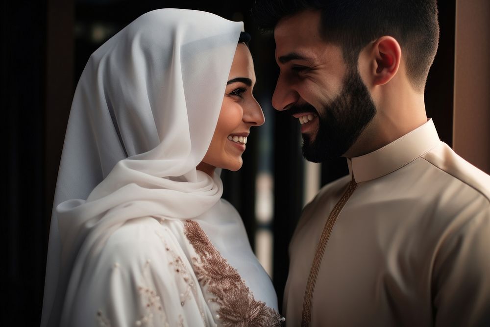 Arabic couple newlywed looking at each other wedding happy bridegroom.