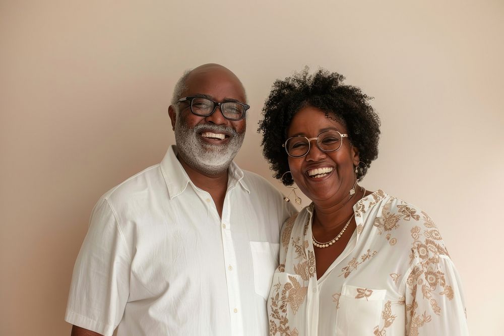 Black senior couple laughing photo accessories.