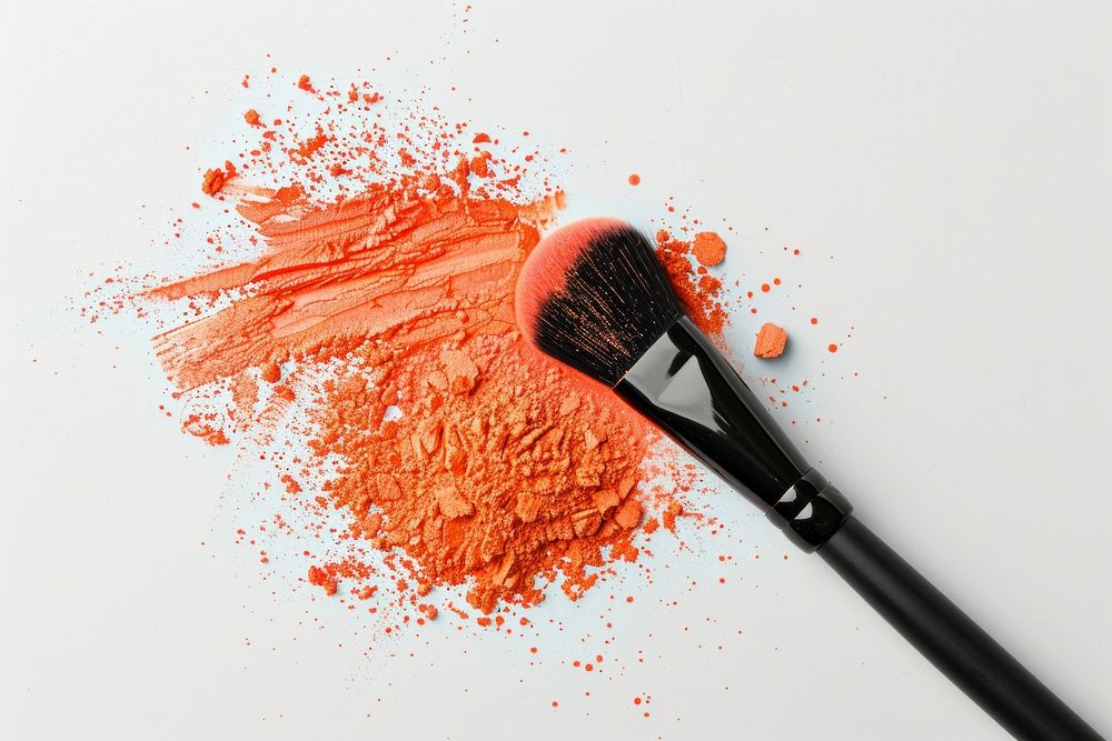 Orange color cosmetics brush powder.
