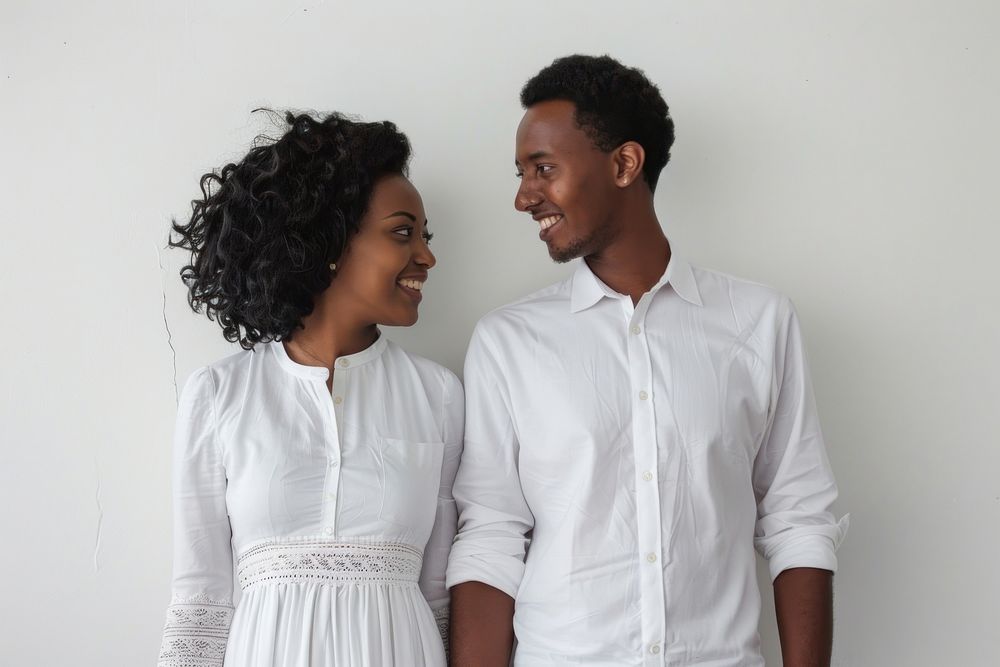Ethiopian couple conversation clothing apparel.