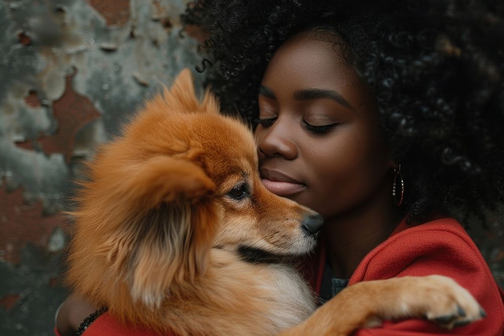 A black girl cuddling a dog photography accessories accessory.