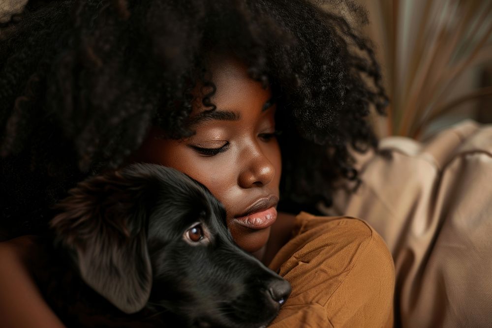 A black girl cuddling a dog photography portrait person.