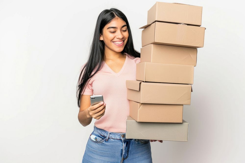 Latinx woman holding stack box cardboard white background mobile phone.