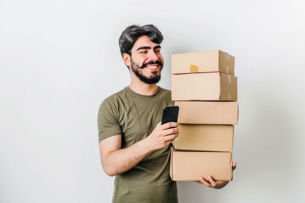 Happy man holding stack box cardboard phone mobile phone.