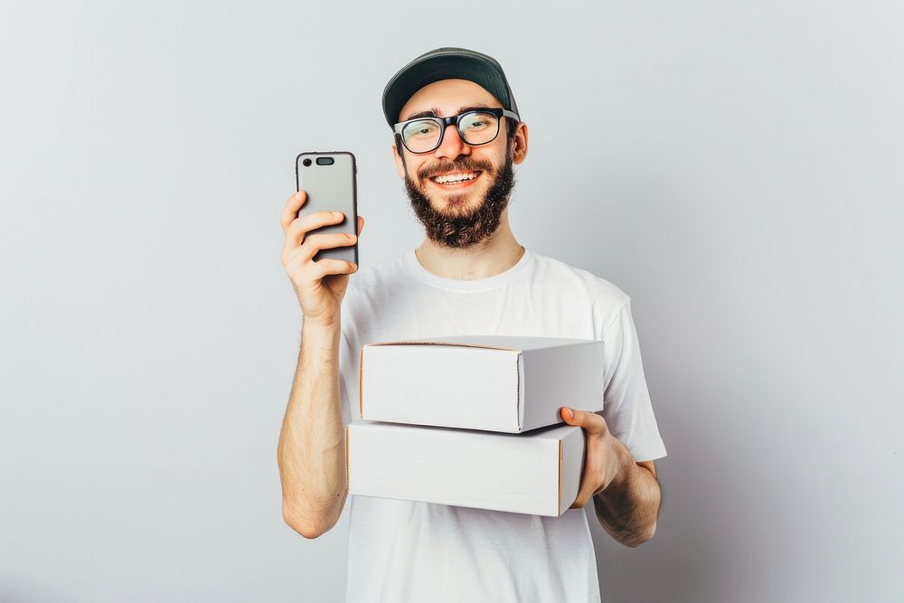 Happy man holding stack box cardboard adult photo.