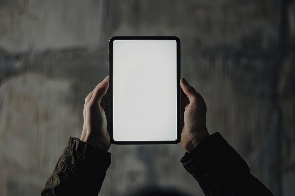 Mobile and tablet mockup person screen photography.