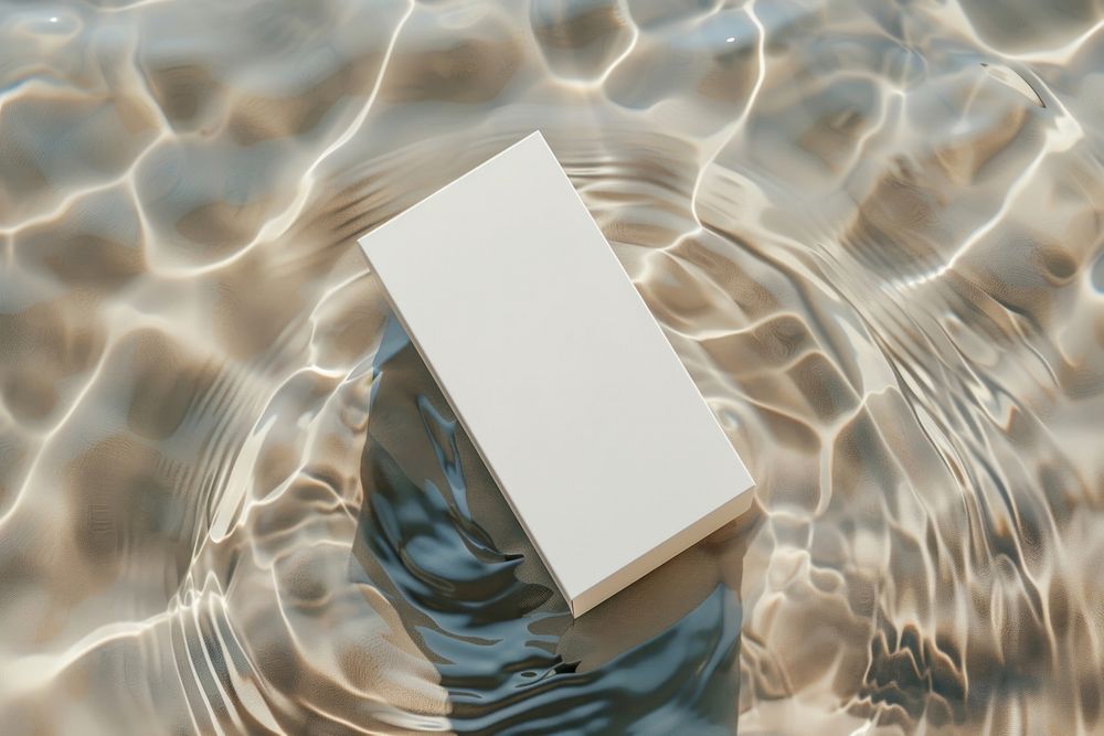 White lotion packaging mockup water electronics outdoors.