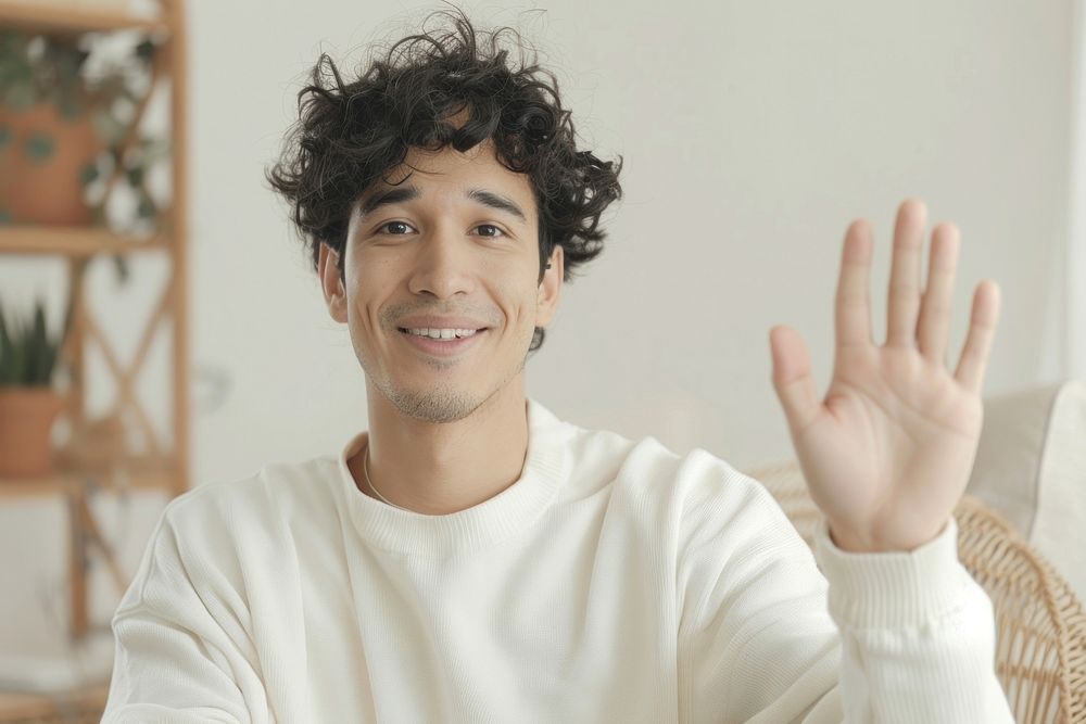 Adult hispanic man waving hand smile dimples person.