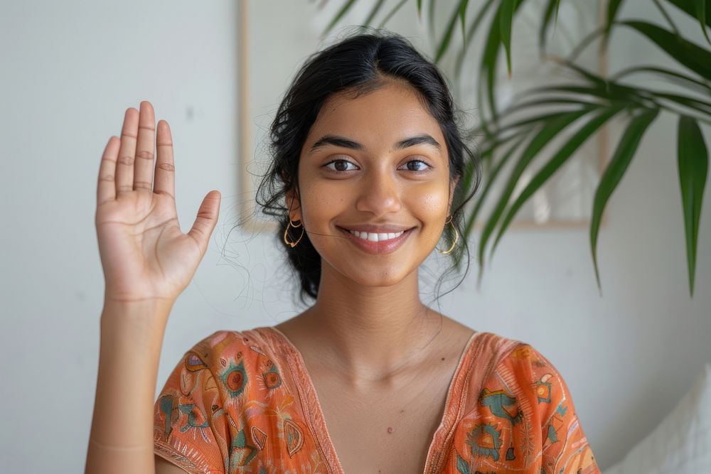 Adult indian woman waving hand smile dimples person.