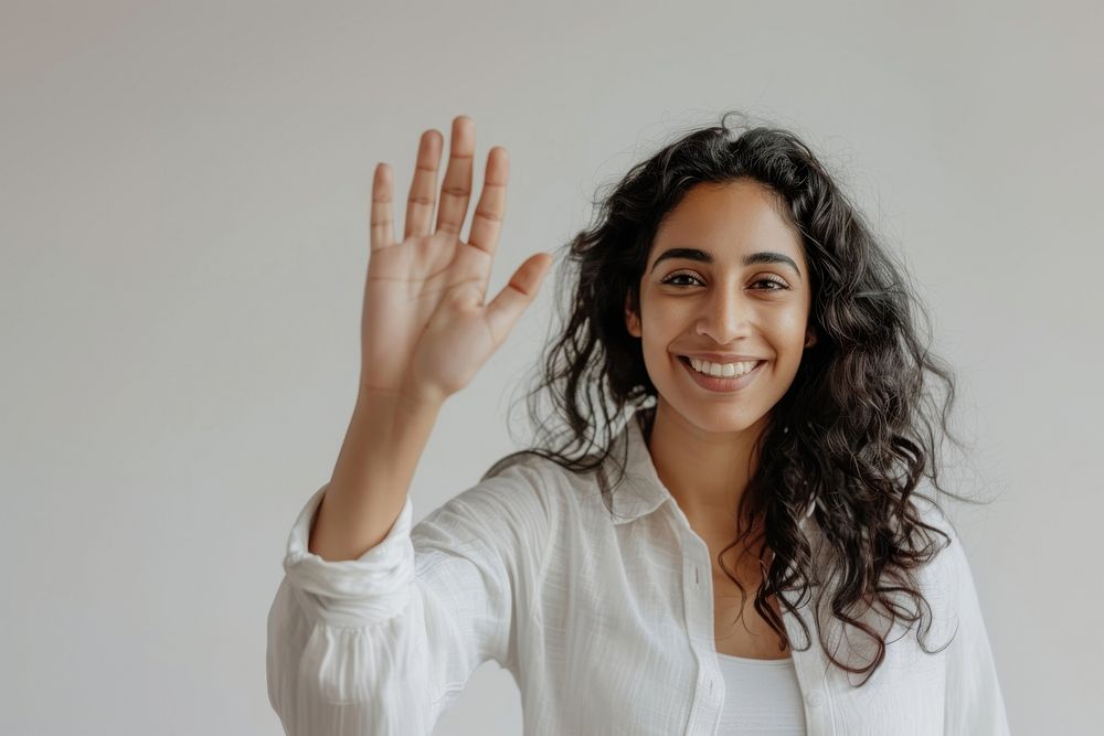 Adult indian woman waving hand smile person female.