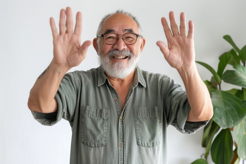 Senior hispanic man waving hand smile accessories accessory.