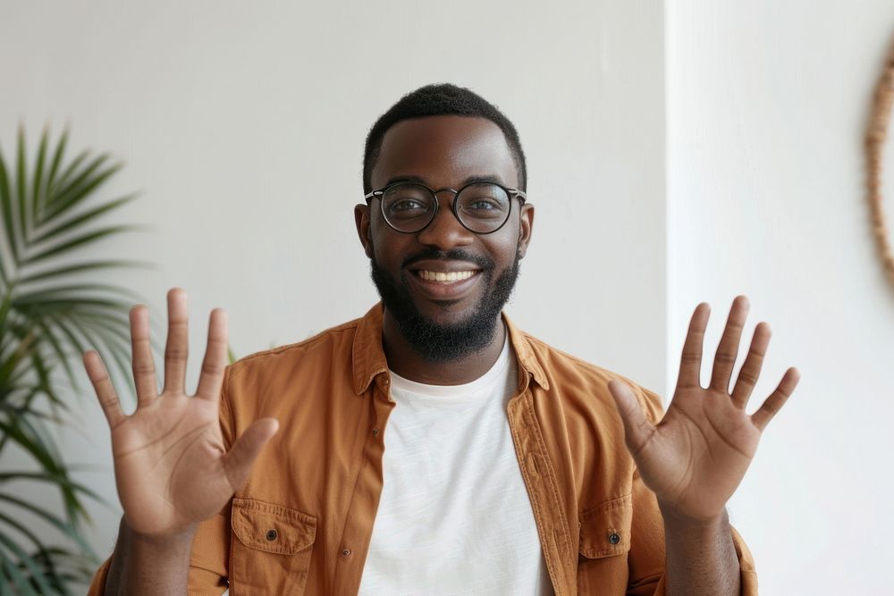 Young black man waving hand smile dimples person.