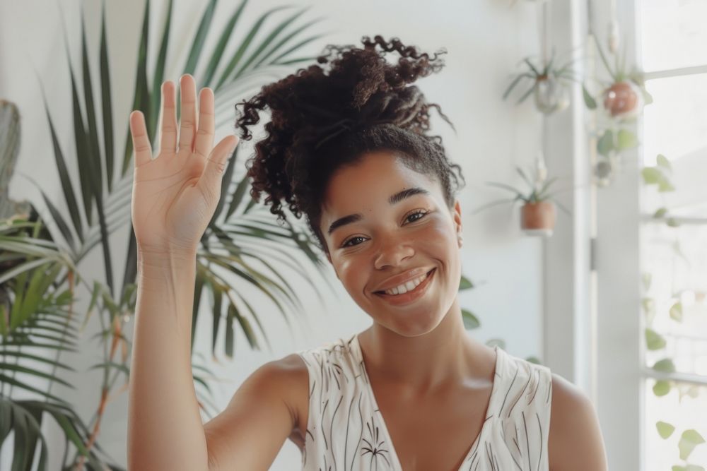 Young black woman waving hand smile dimples person.