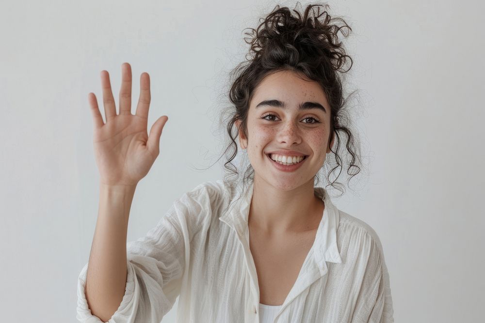 Young woman waving hand smile person female.