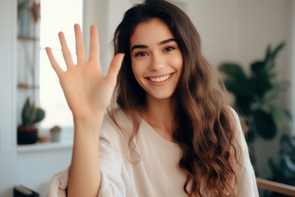Young woman waving hand smile dimples person.