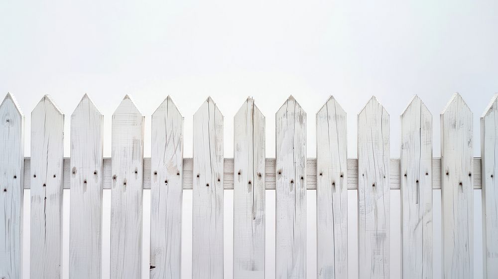 New white painted wooden fence outdoors nature yard.