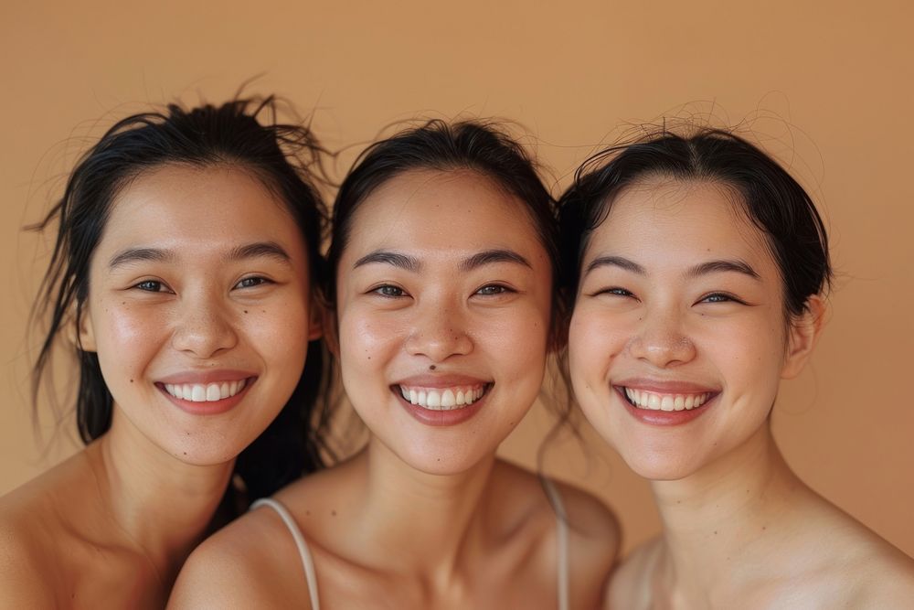 South East Asian women face with no makeup happy laughing wedding.