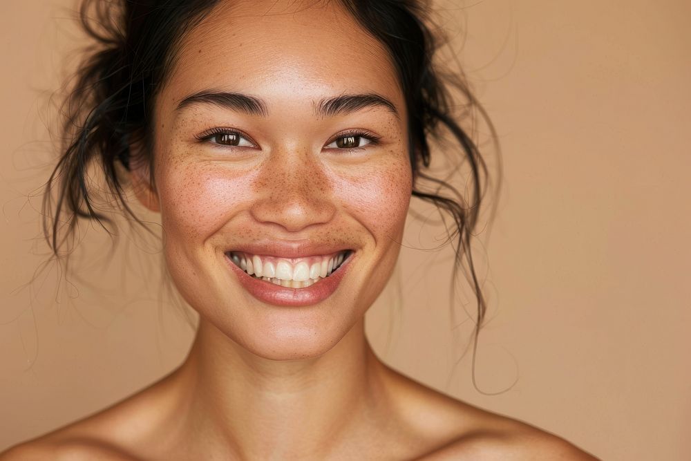 Middle age South East Asian woman happy smile skin.