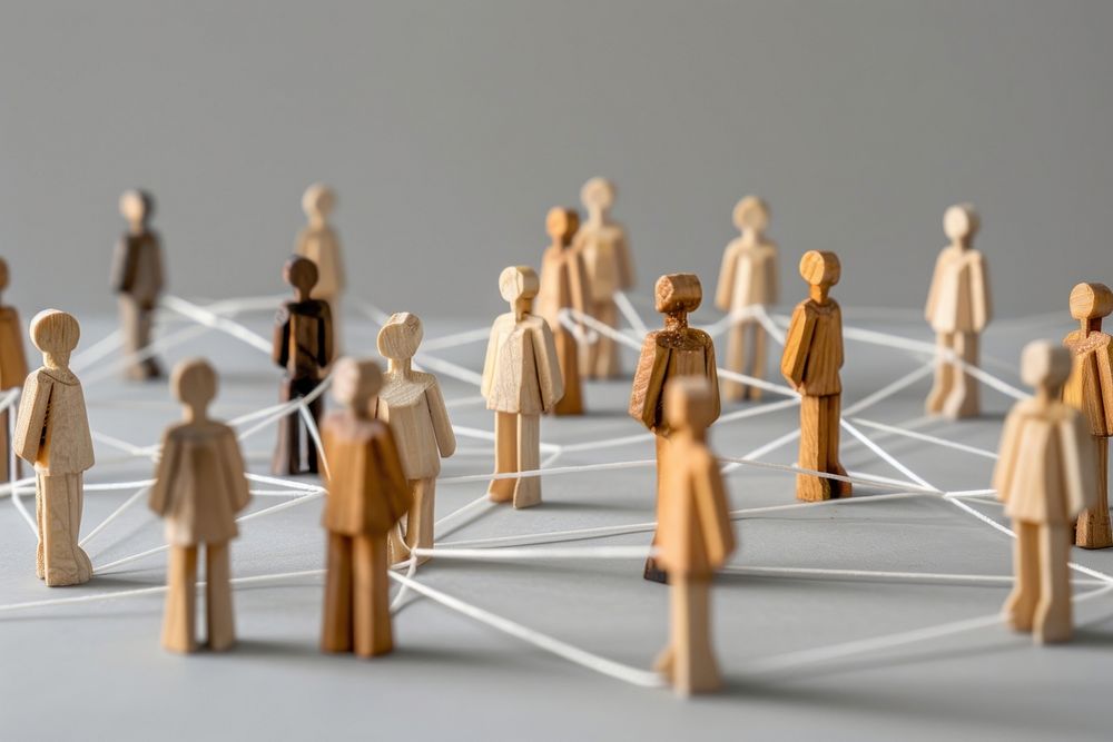 Chain of people figurines connected by white lines person chess human.