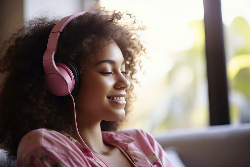 Afro American teen woman headphones happy electronics.