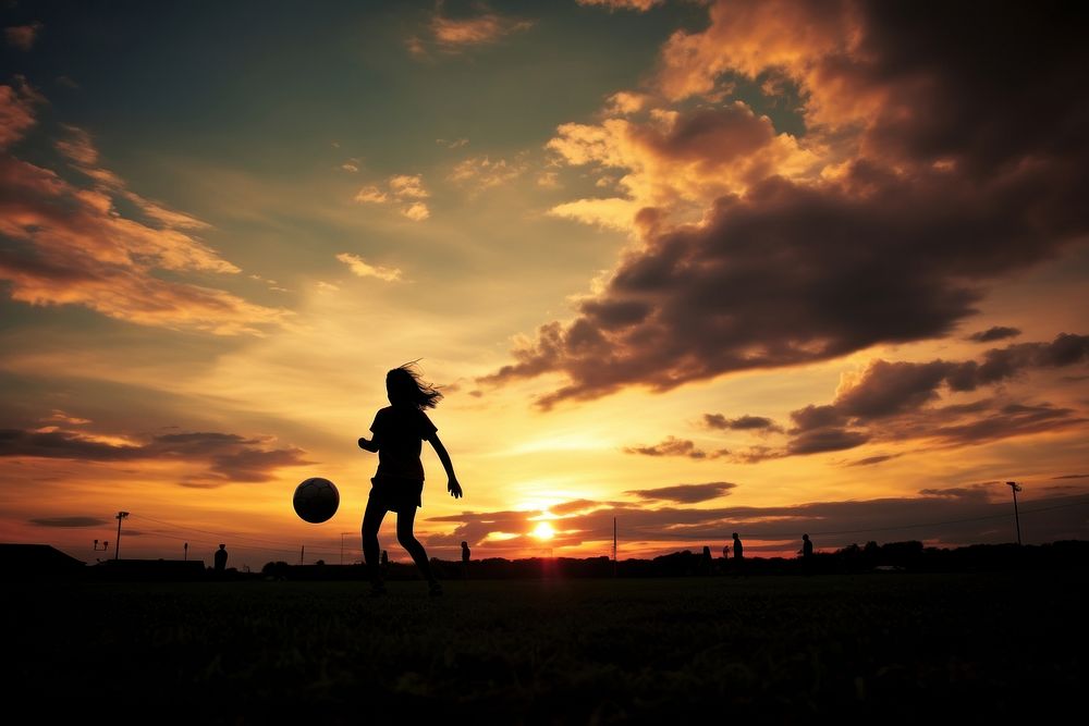 Person play football silhouette photography outdoors sunlight nature.