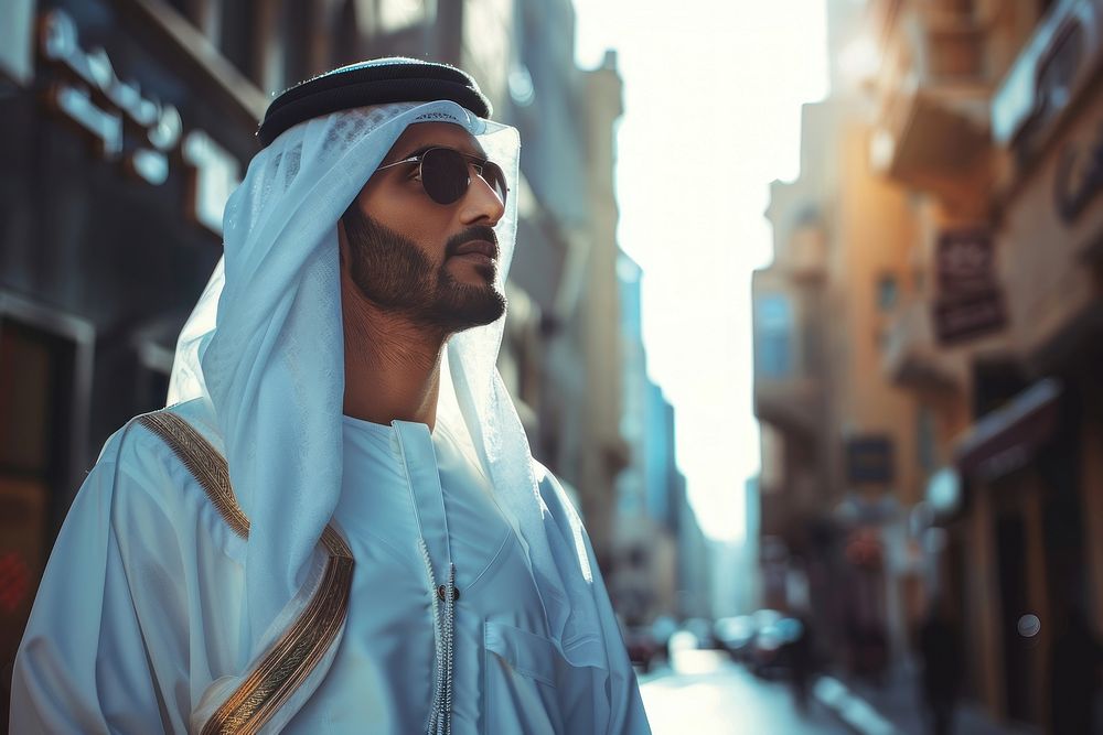 Arab Middle Eastern man wearing emirati kandora traditional clothing in the city people person human.