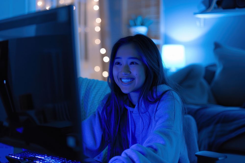South asian woman happy electronics lighting.