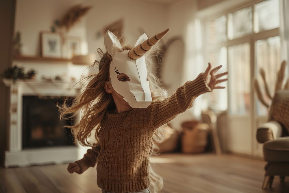 Girlie in paper box unicorn mask female person child.