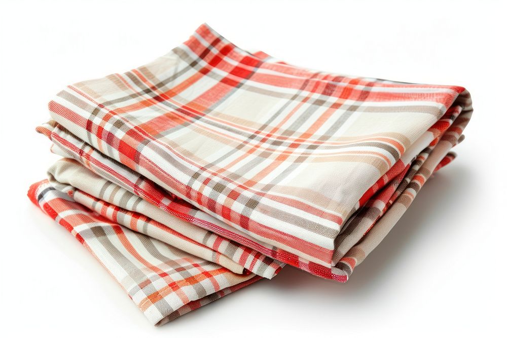 Folded napkins with plaid blanket diaper.