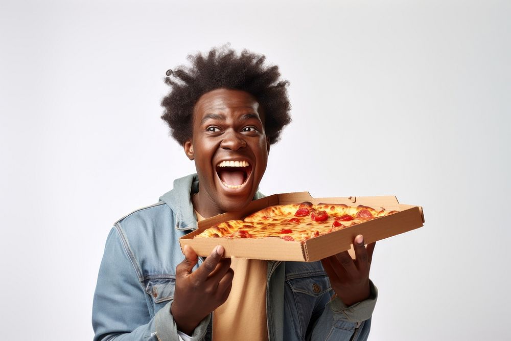 Happy African Young Man Enjoying Pizza Biting Tasty Slice biting happy pizza.