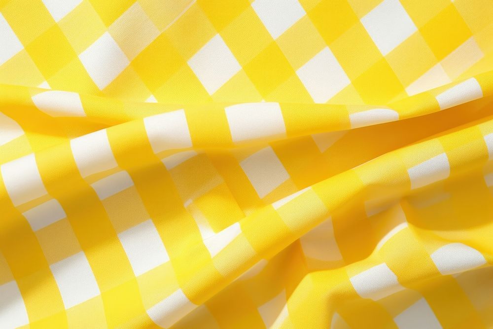 Yellow gingham pattern tablecloth.