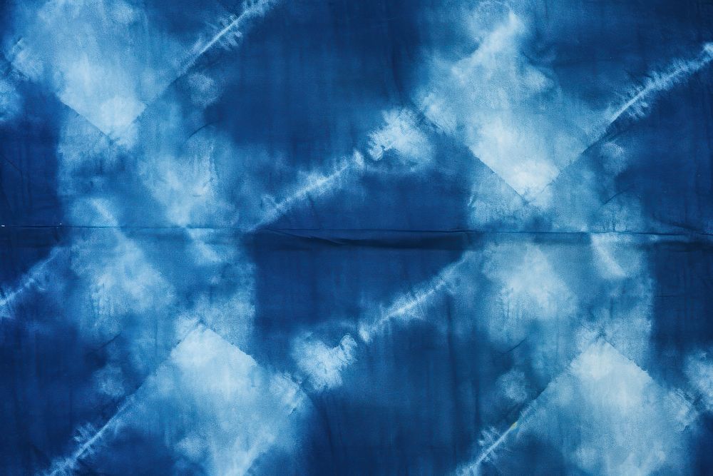 Indigo blue tie-dye textile shibori pattern.