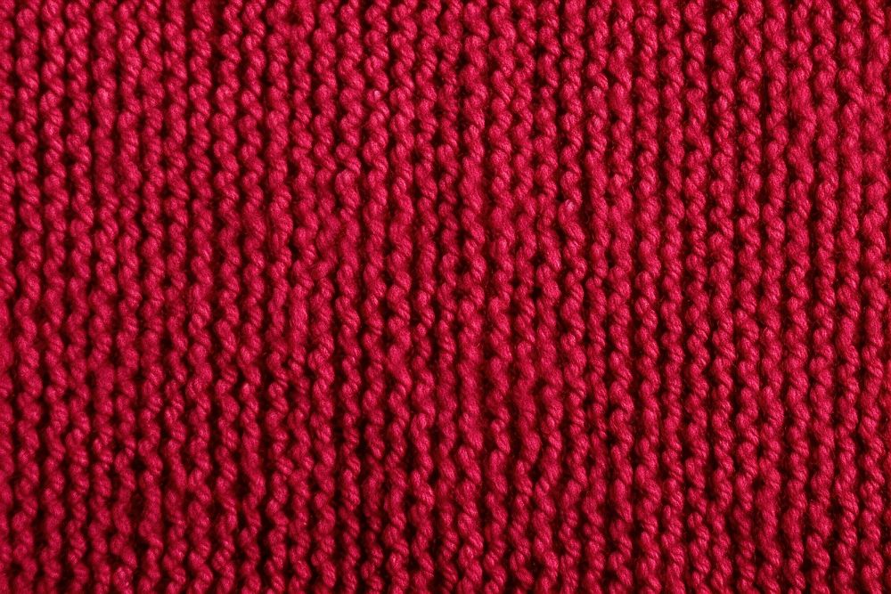 Knit red berry color texture knitting person.